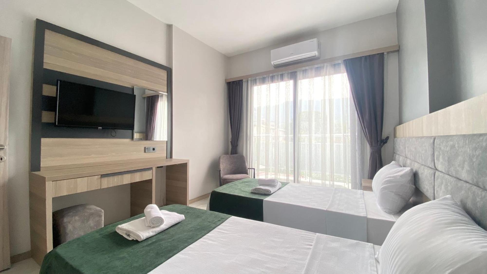 Medos Beach Hotel คูซาดาซี ภายนอก รูปภาพ