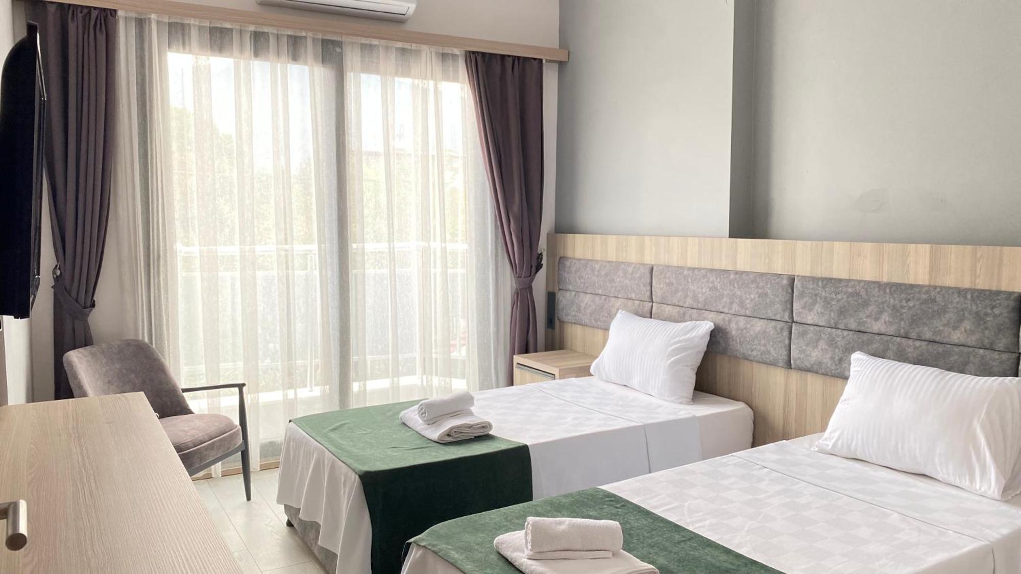 Medos Beach Hotel คูซาดาซี ภายนอก รูปภาพ